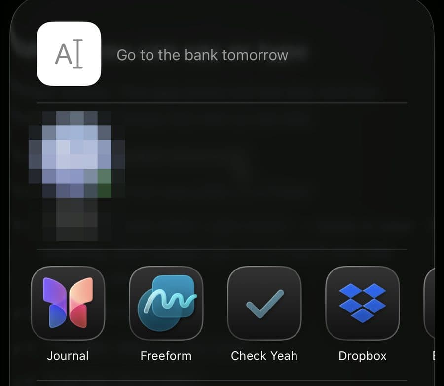 The iOS share sheet with the text Go to the bank tomorrow and Check Yeah among the app icons.